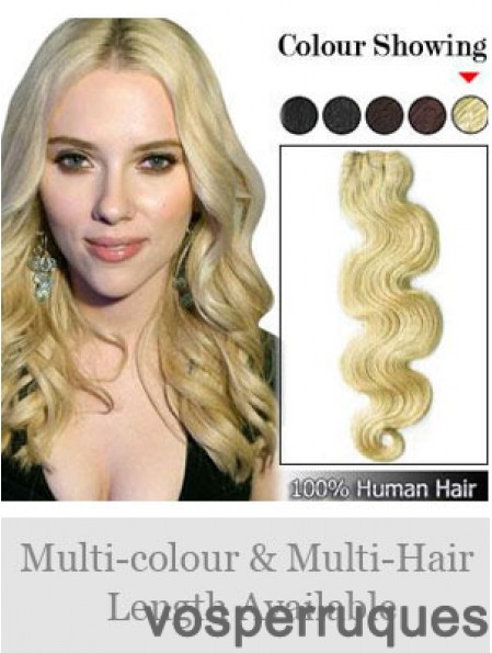 Extensions de trame à la mode blonde ondulée Remy cheveux humains